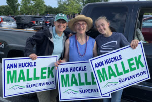 Ann with family and campaign signs